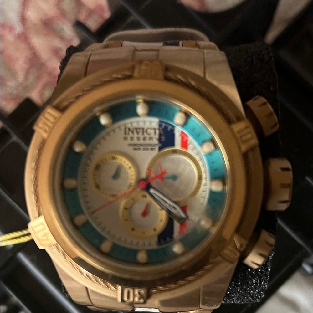 Invicta Gold Chronograph Watch with Turquoise and White Dial